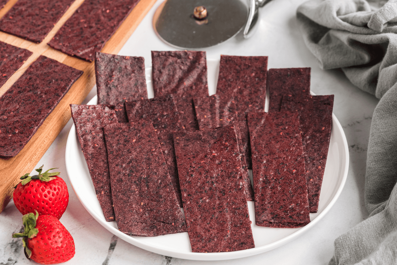 https://foodrevolution.org/blog/how-to-dehydrate-food-guide/attachment/mixed-berry-and-banana-fruit-leather-4-2/