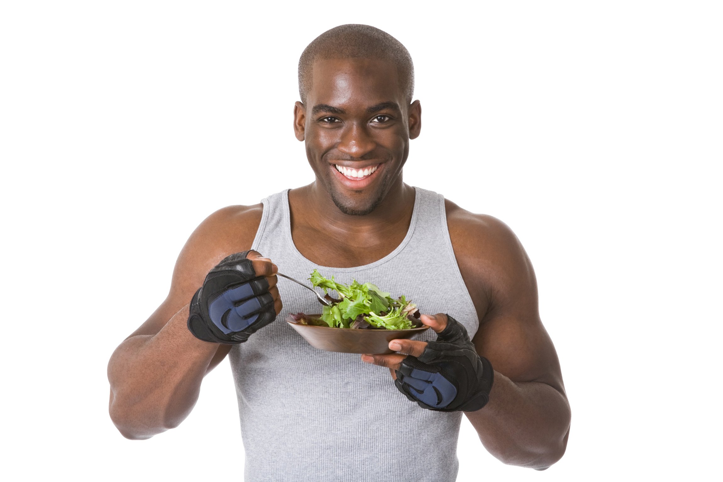 body builder eating broccoli