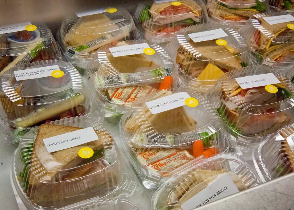 A variety of premade sandwiches at a school