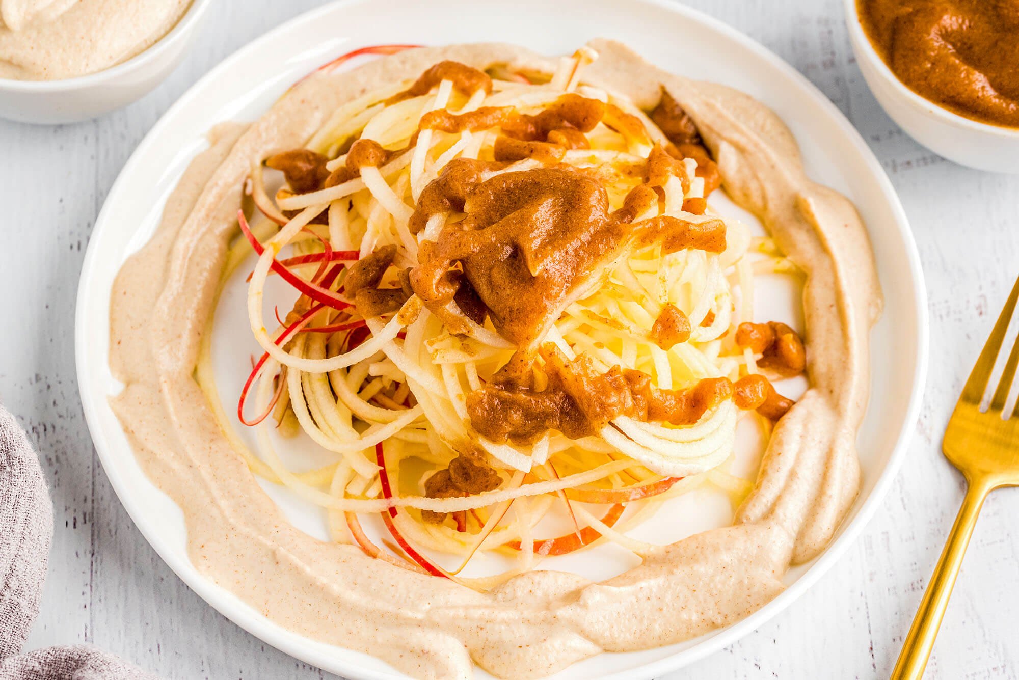 https://foodrevolution.org/wp-content/uploads/Apple-Strings-with-Caramel-Cashew-Cream-2.jpg