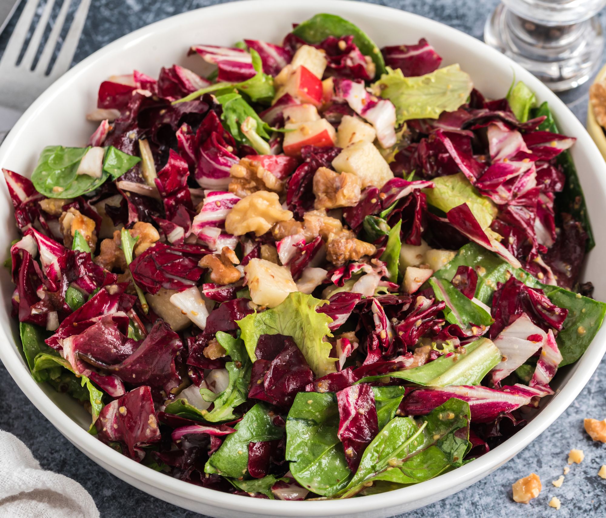 Chicory Salad with Sweet Mustard Dressing in a white bowl