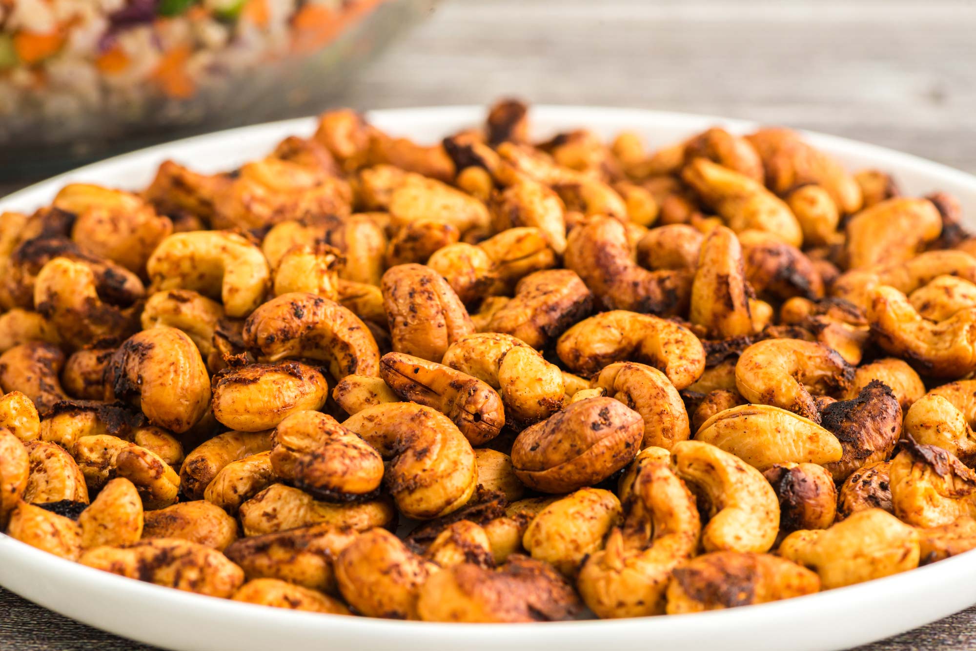 chili spiced cashews on plate