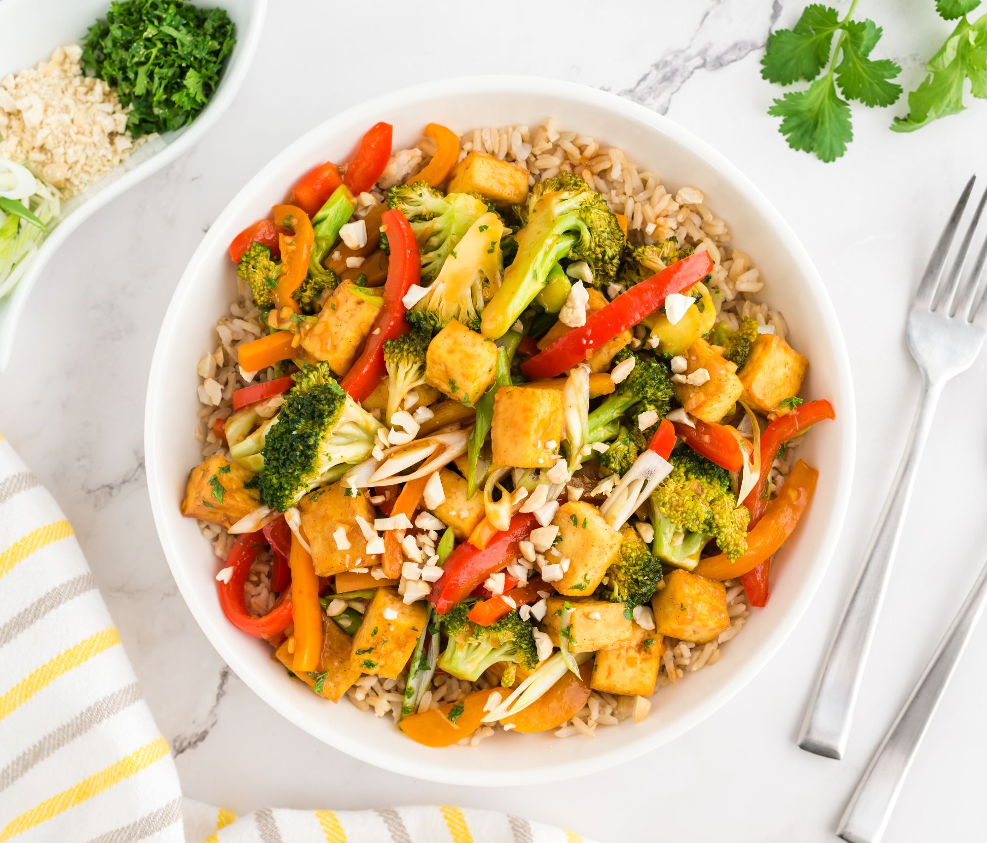 Simple Kung Pao Tofu and Broccoli on a dining table