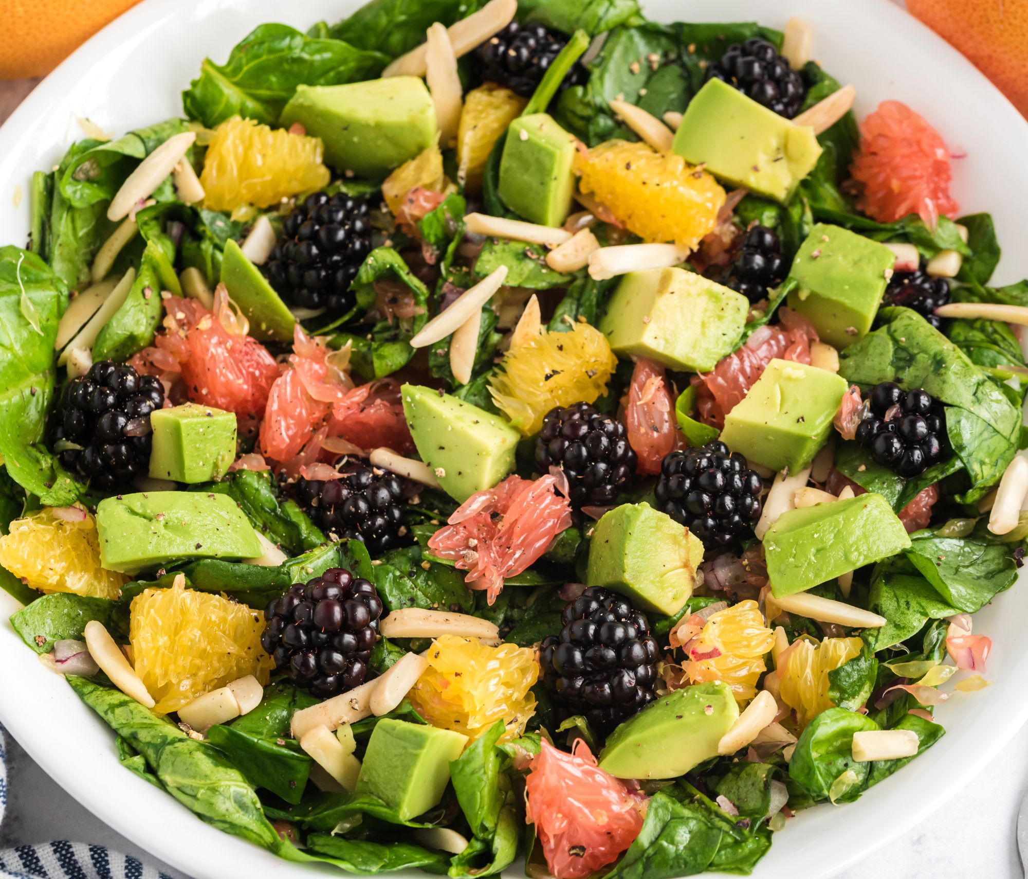 Summer Citrus Salad in a white bowl