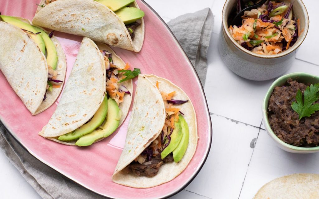 Tacos With Refried Beans and Jicama Slaw