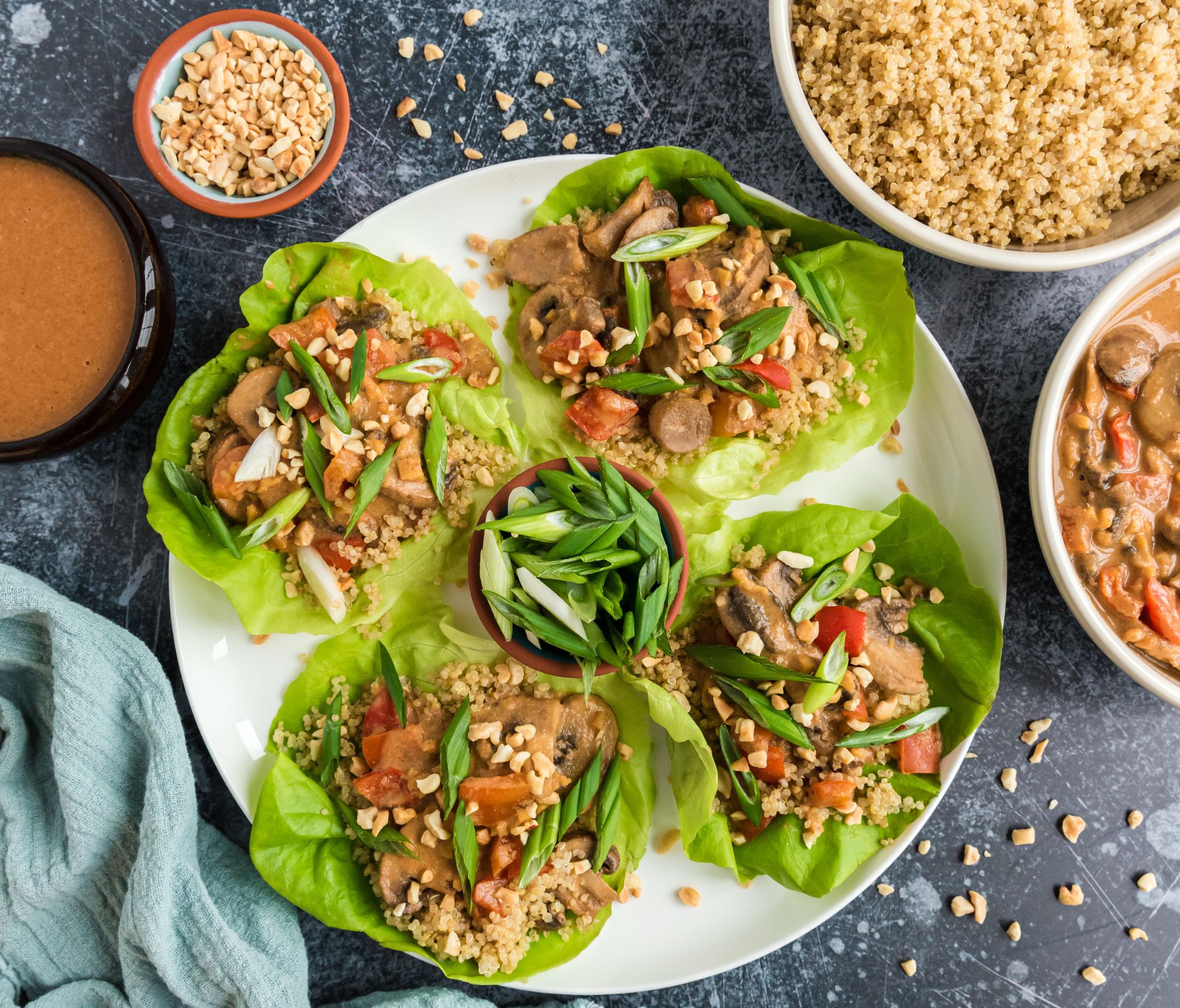 Teriyaki Mushroom Lettuce Cups on a plate near other Mediterranean side dishes