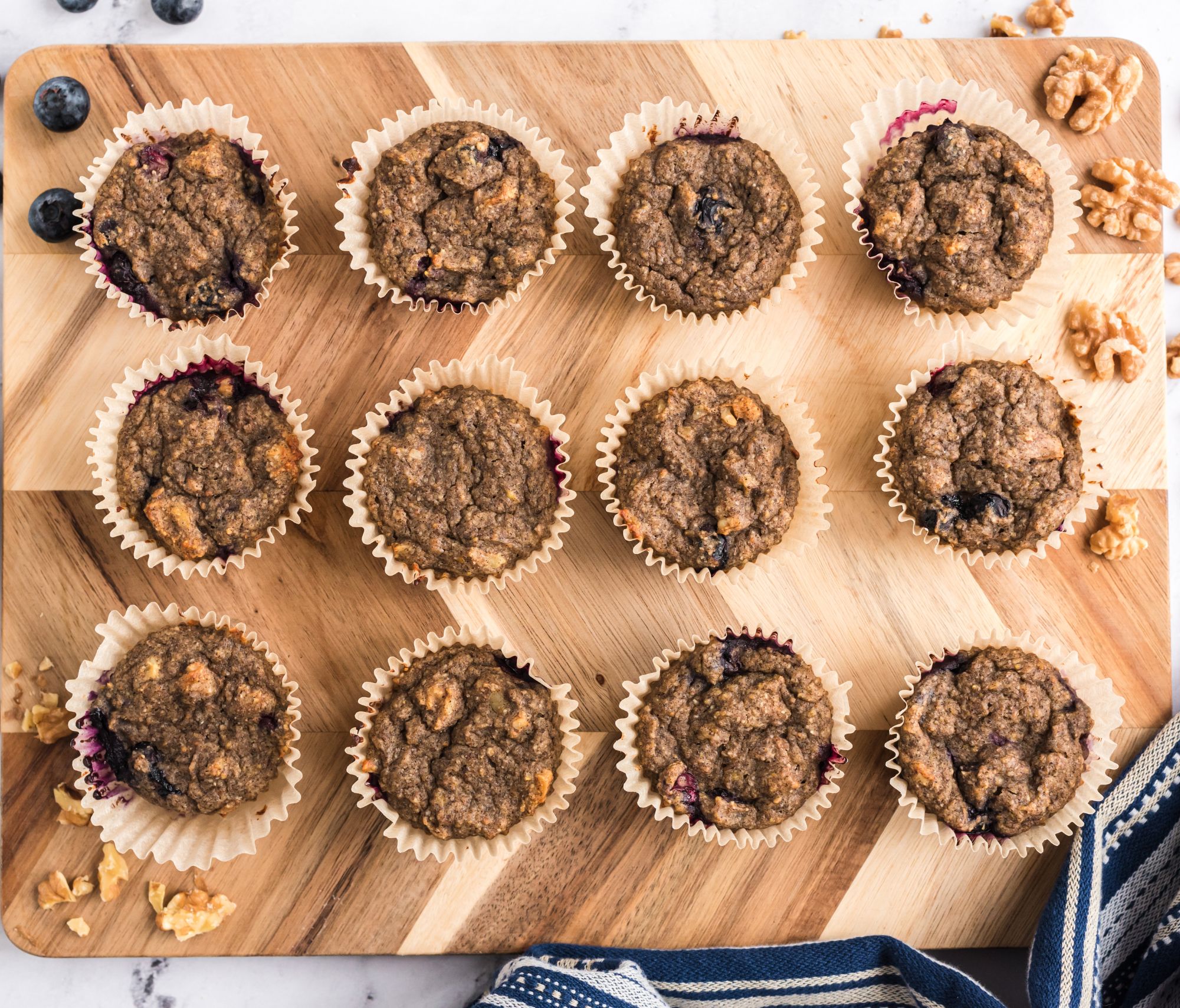 Blueberry Buckwheat Breakfast Muffins on a cutting board
