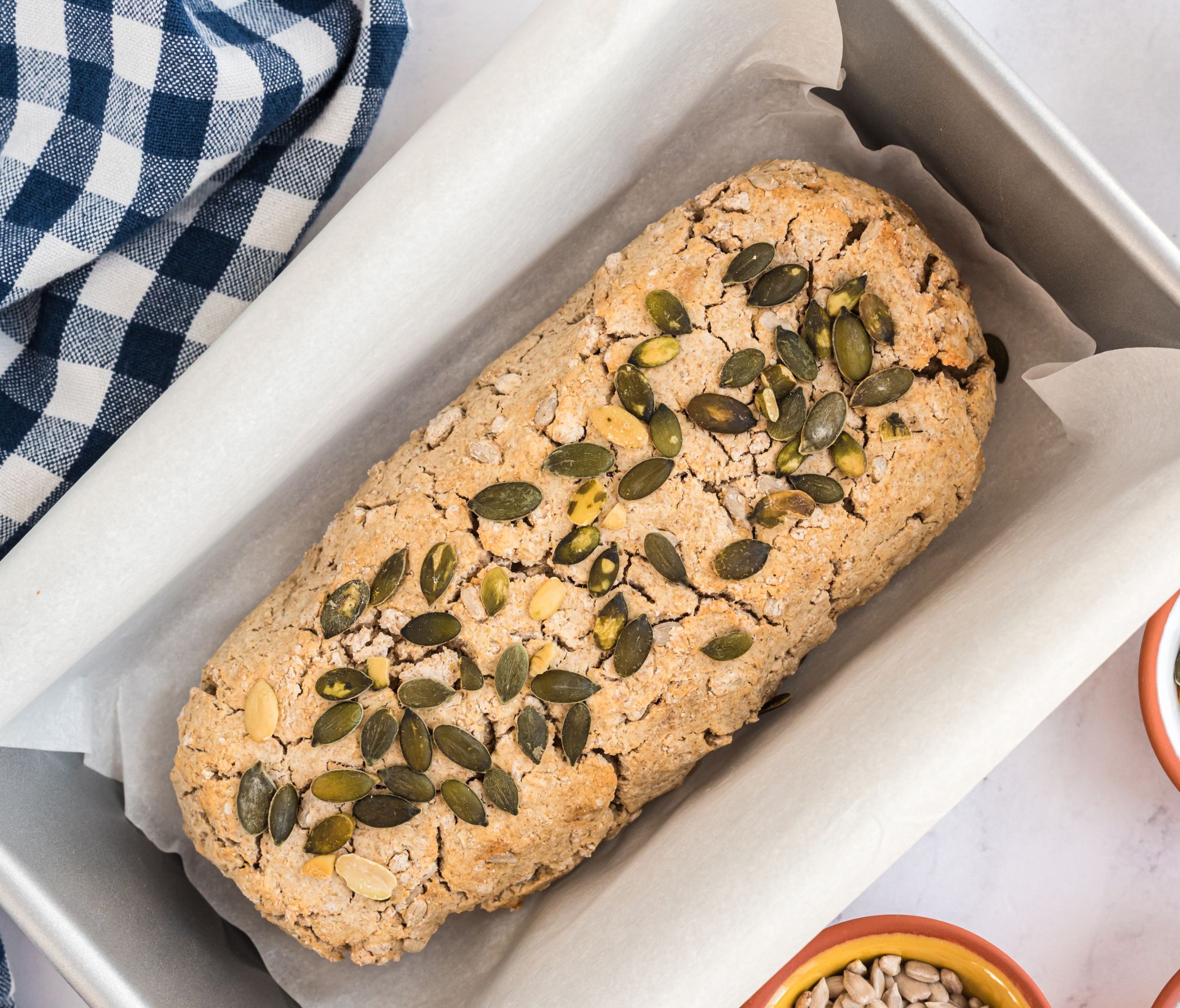 Three-Seed Fermented Buckwheat Bread in a baking dish