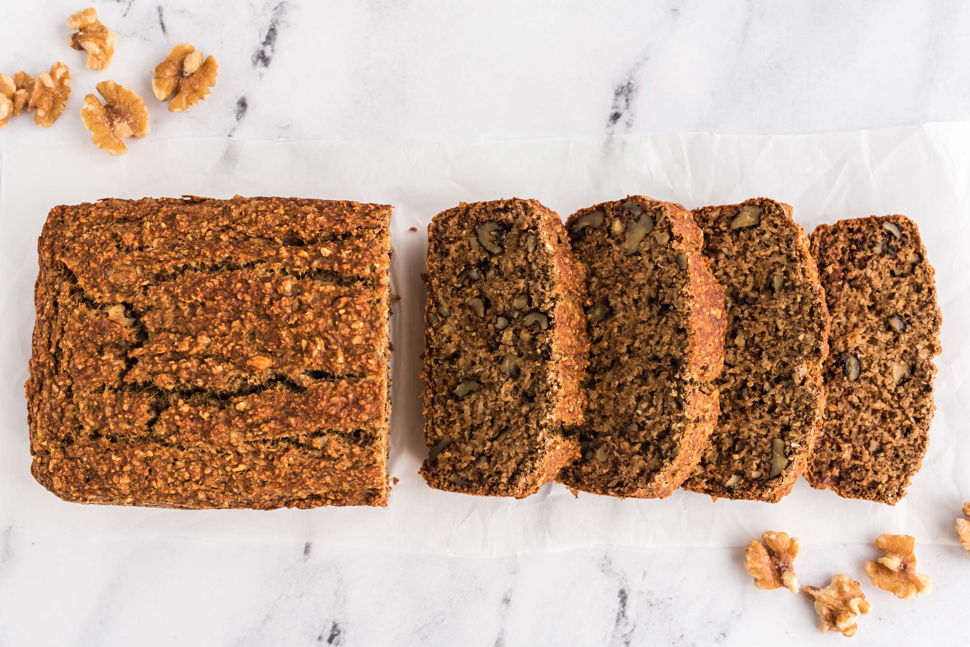 banana walnut bread sliced on table