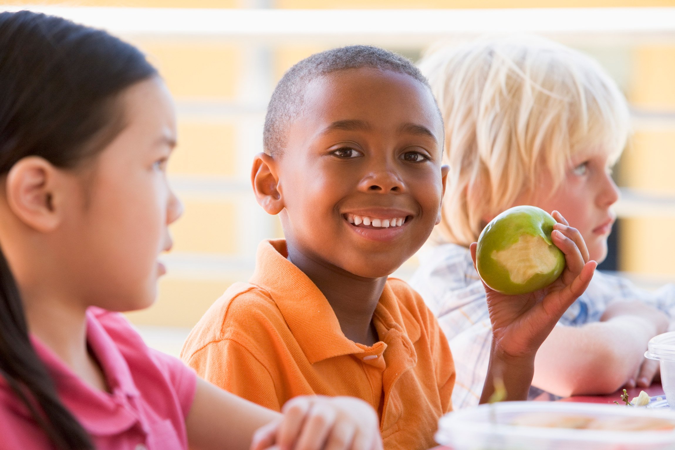 Diverse students at school lunch