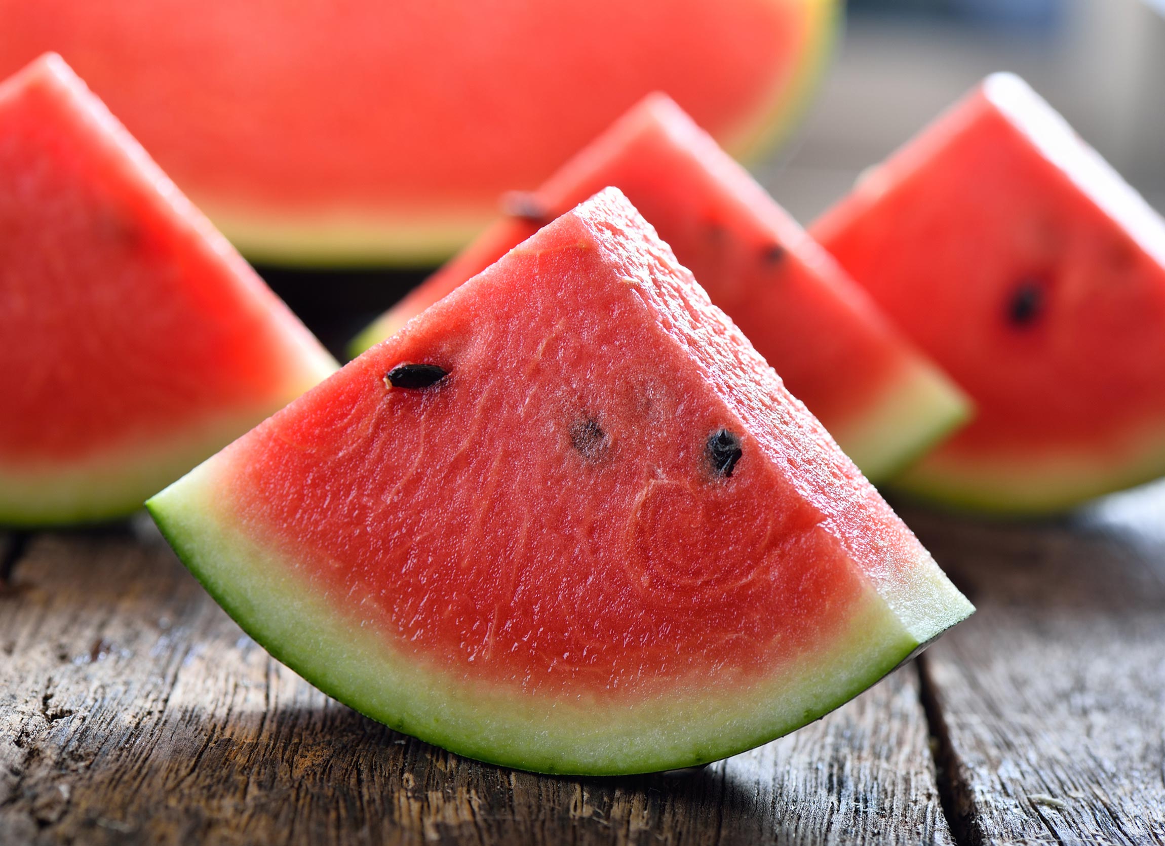 sliced watermelon on table