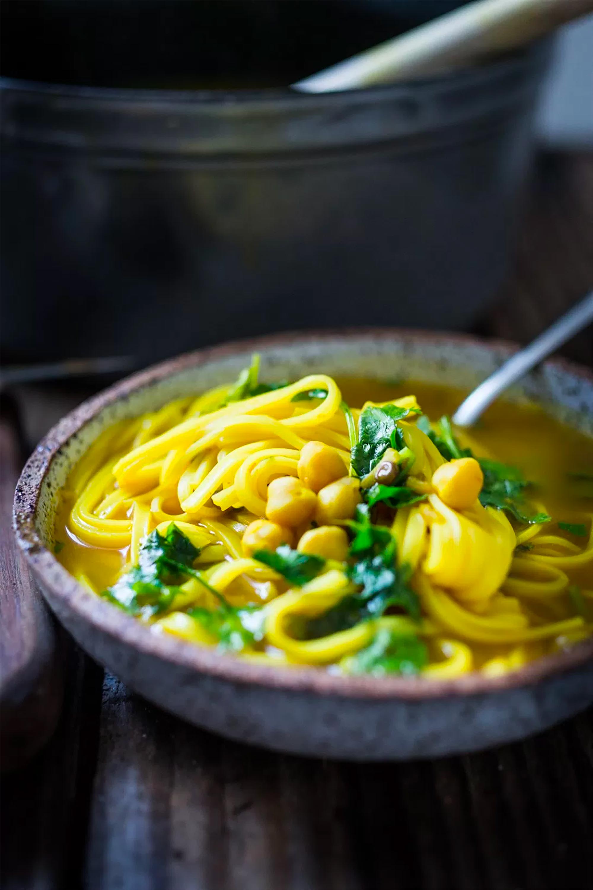 bowl of turmeric broth soup