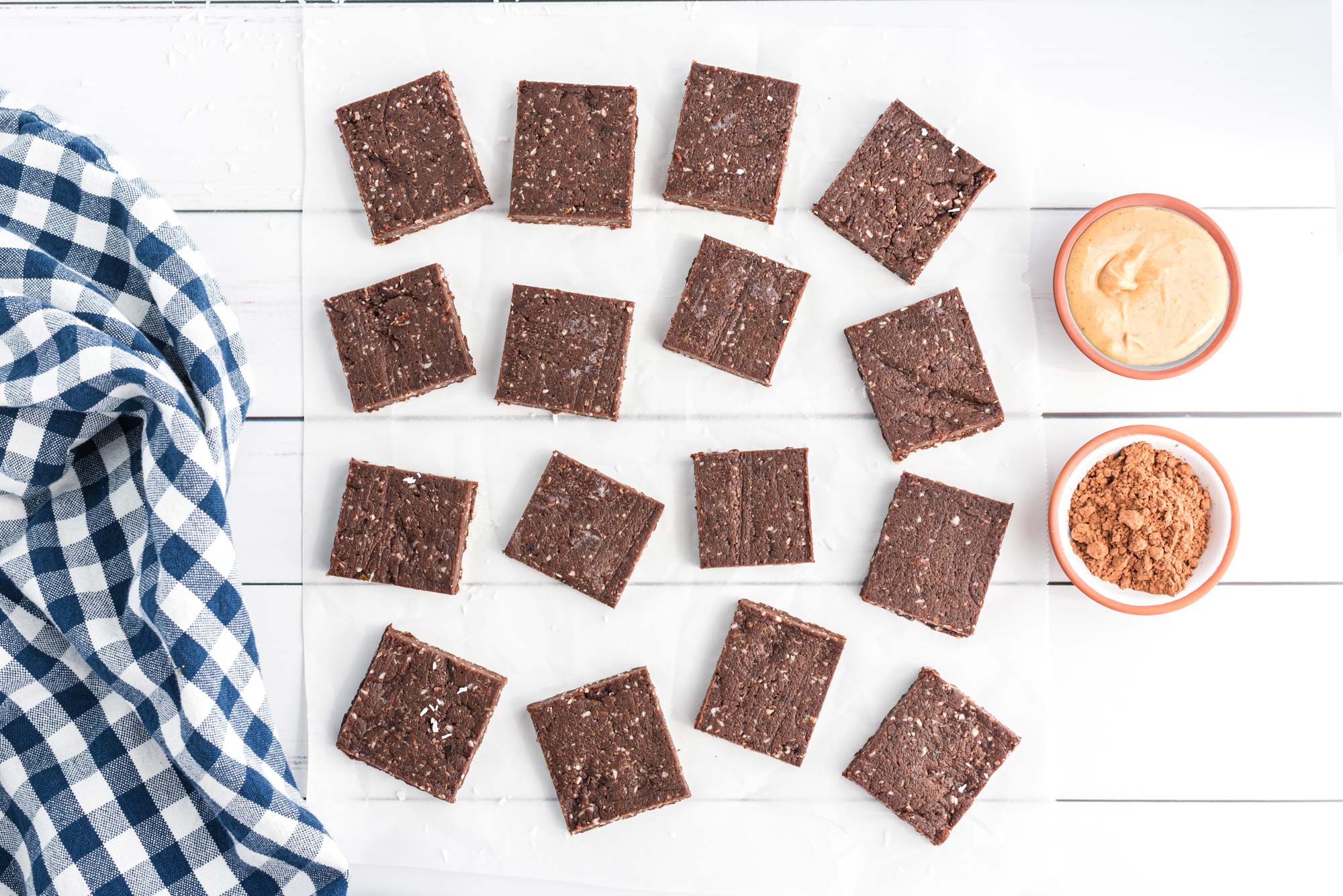 cacao peanut butter energy bite squares on table