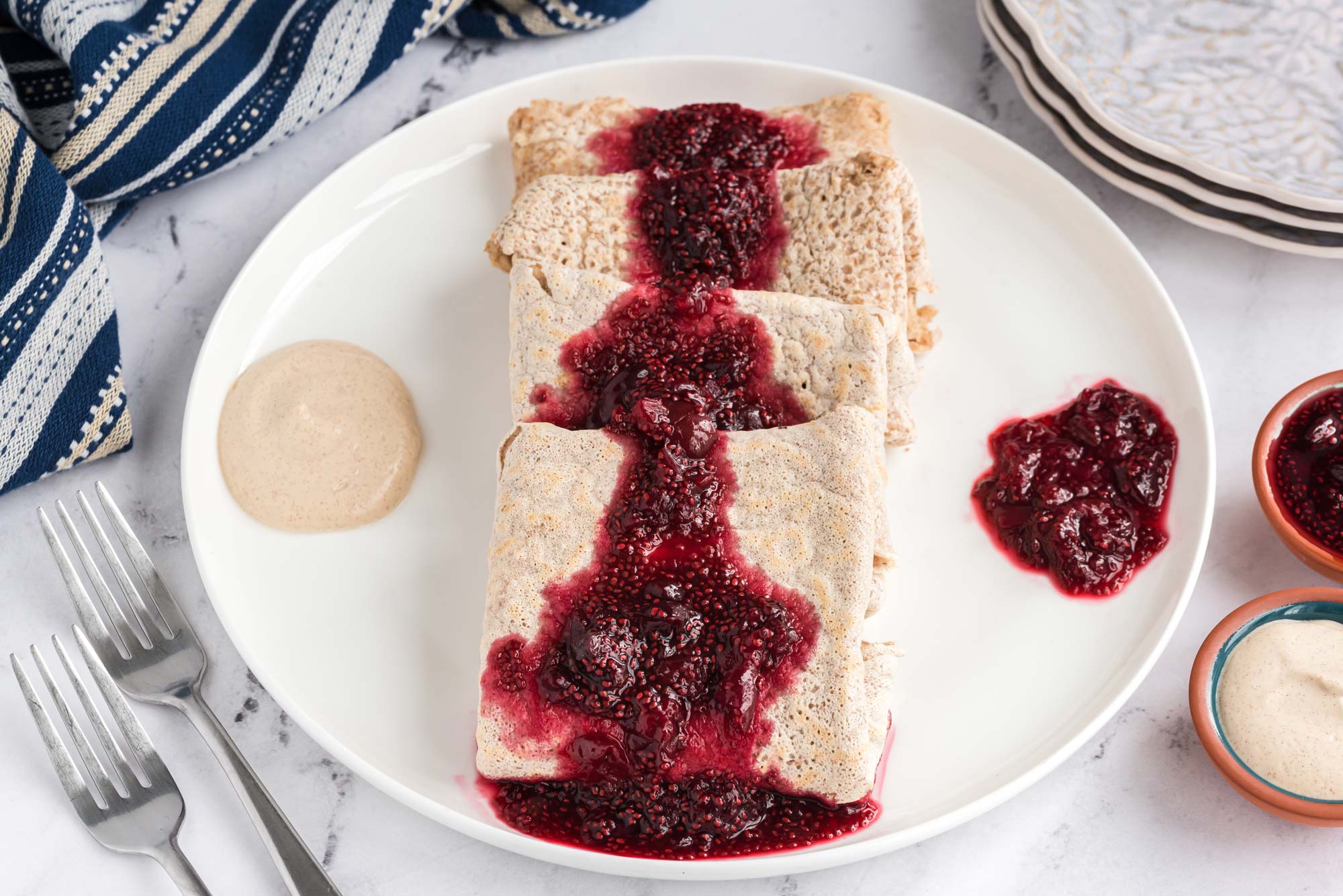 cherry vanilla crepe on plate