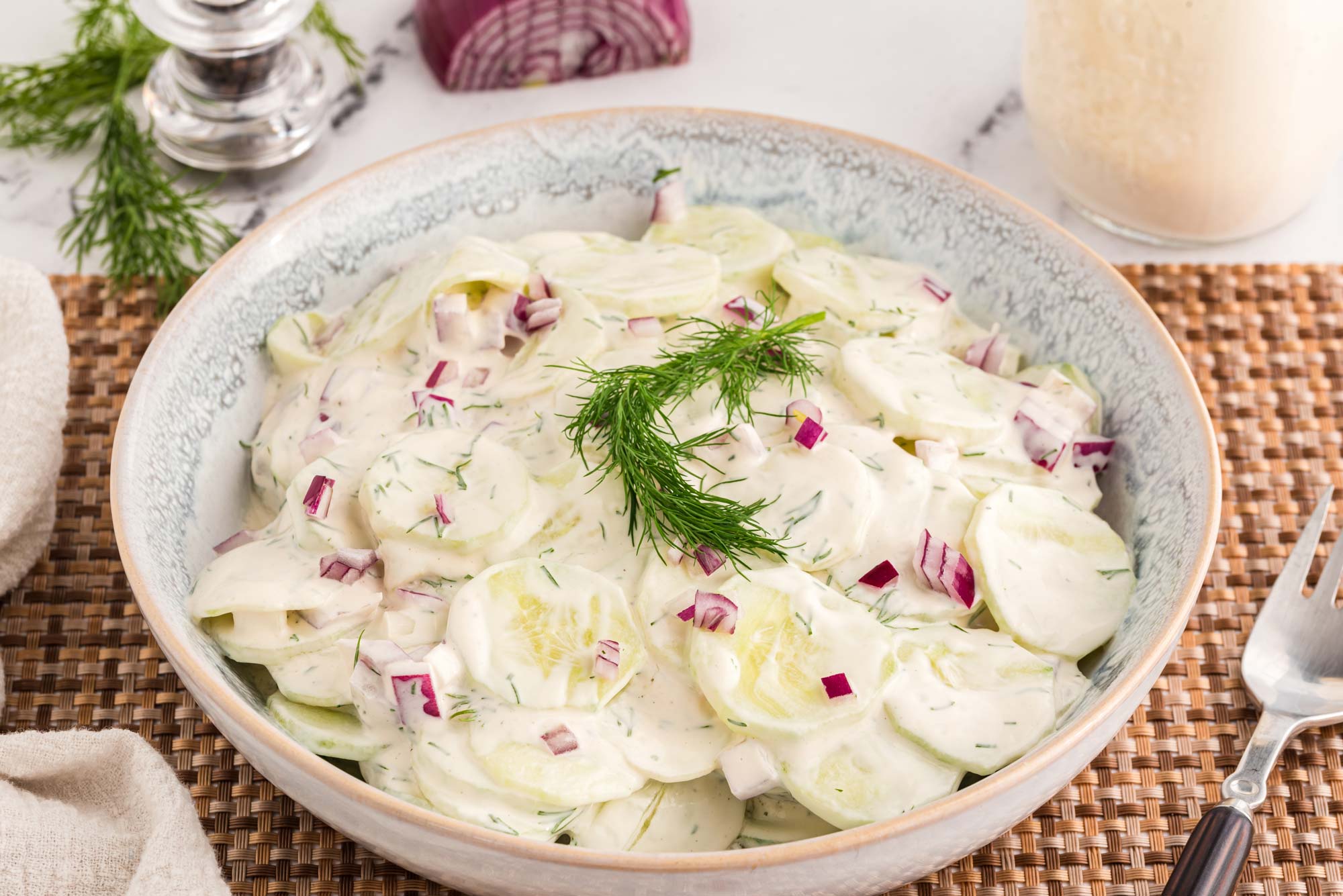 creamy cucumber dill salad in bowl