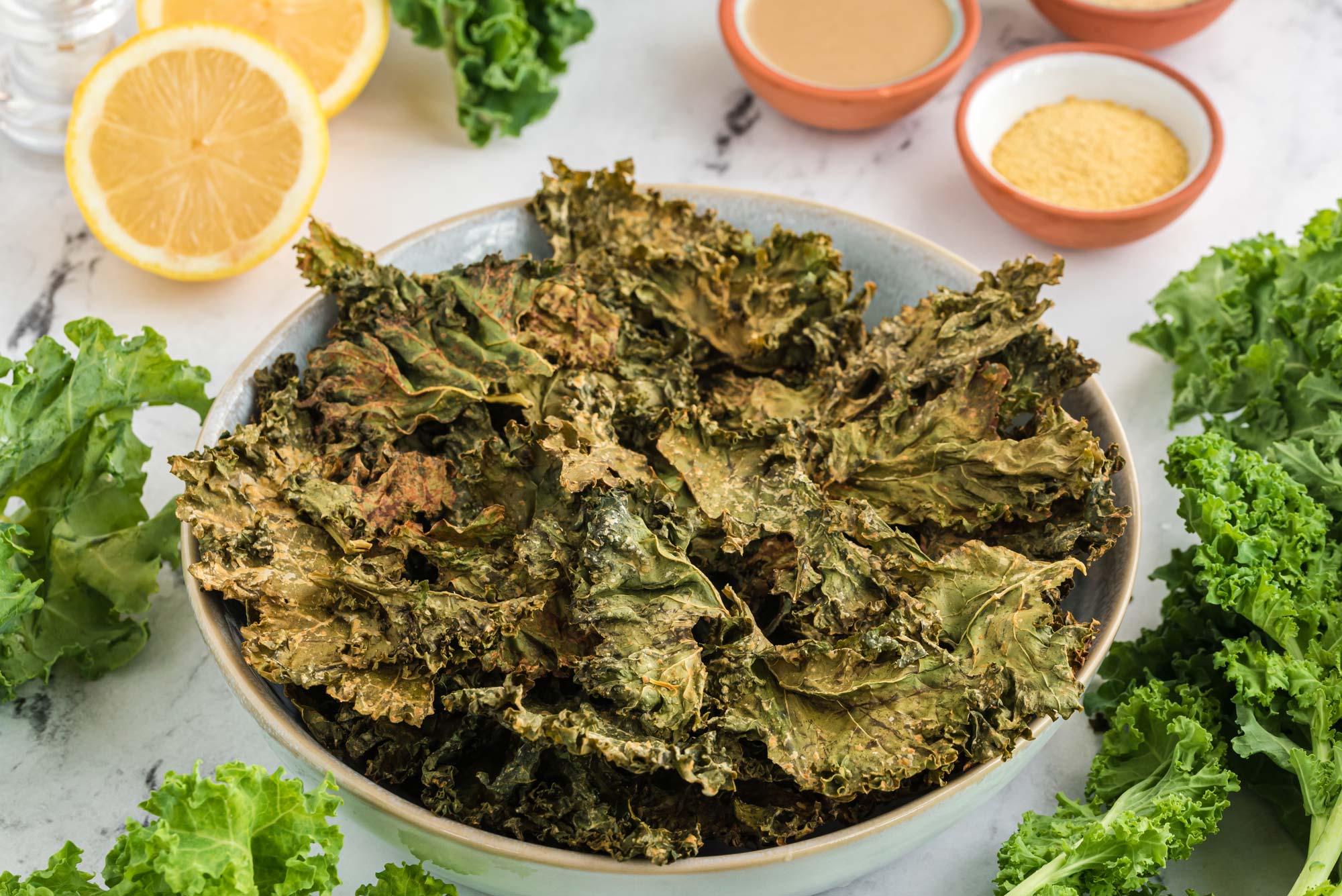 healthy dining recipe: crispy cheesy kale chips in a bowl