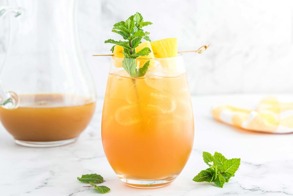 ginger turmeric pineapple lemonade in glass
