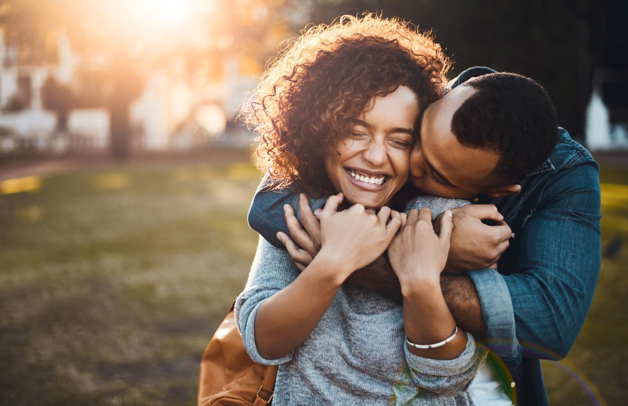 couple hugging and smiling