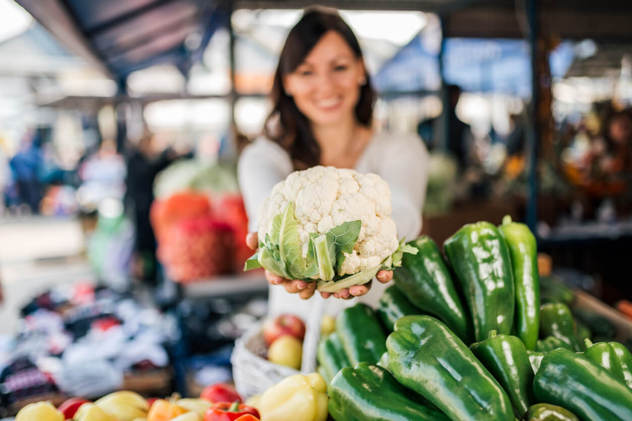 buying cauliflower at farmers market focus on the cauliflower