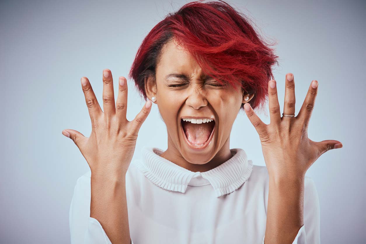 woman upset about her hair and nail health