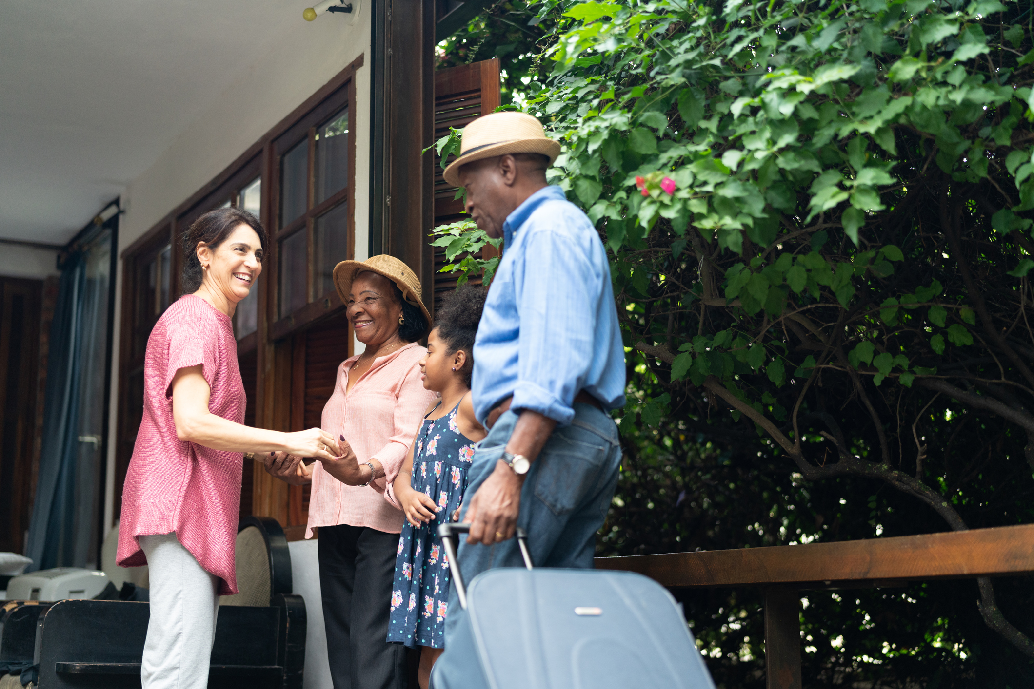 Family meeting their host at a homestay