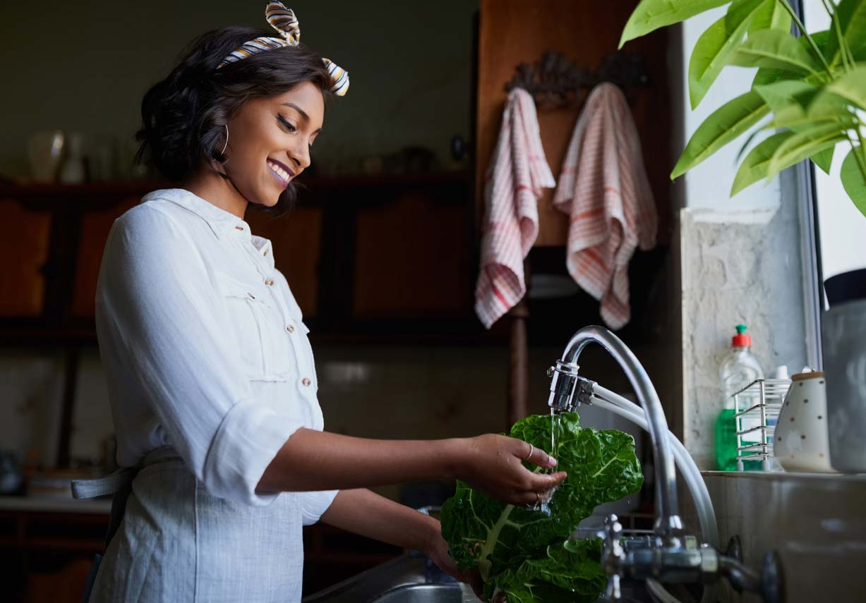 woman washing greens