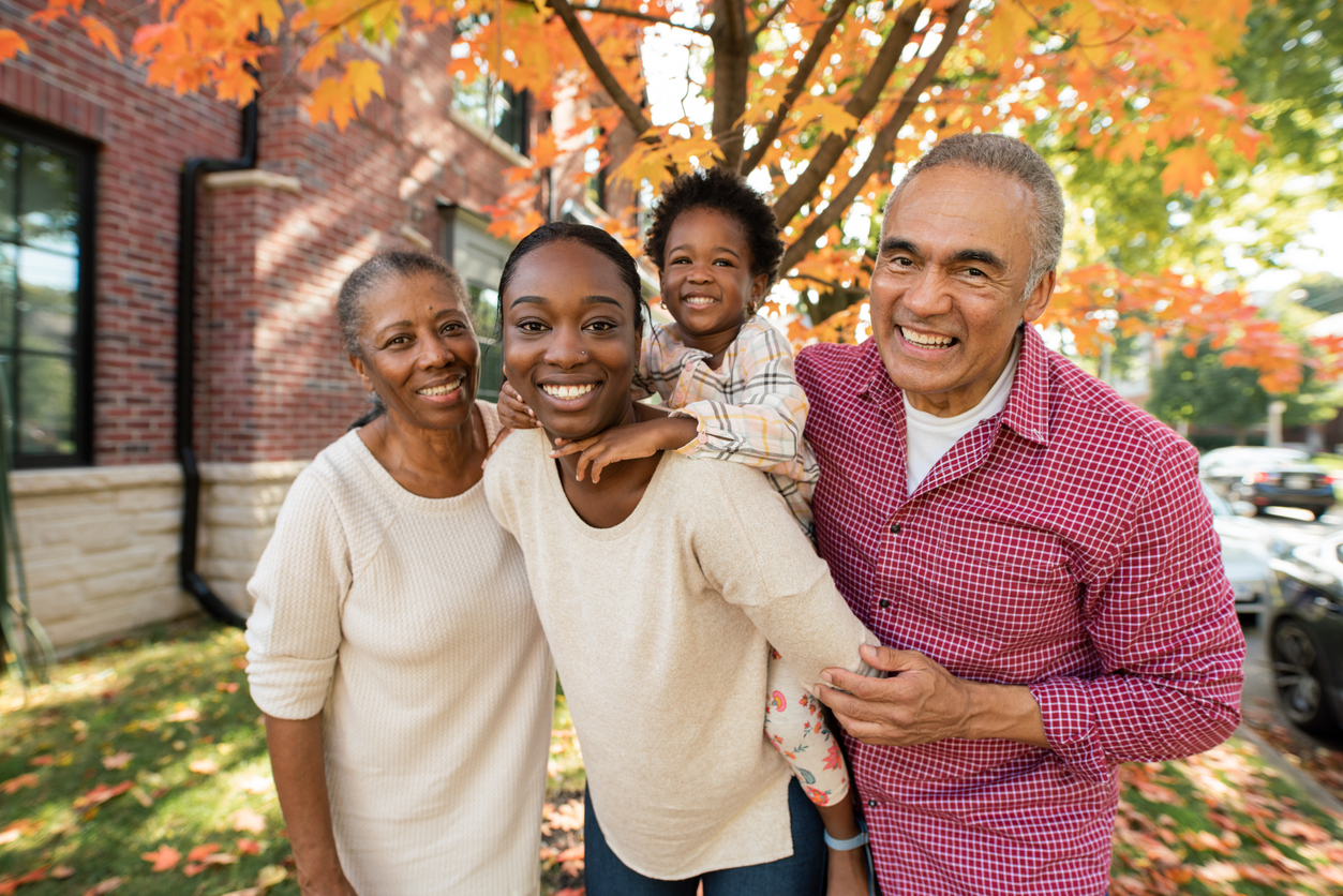 Multi-generation family playing outdoor