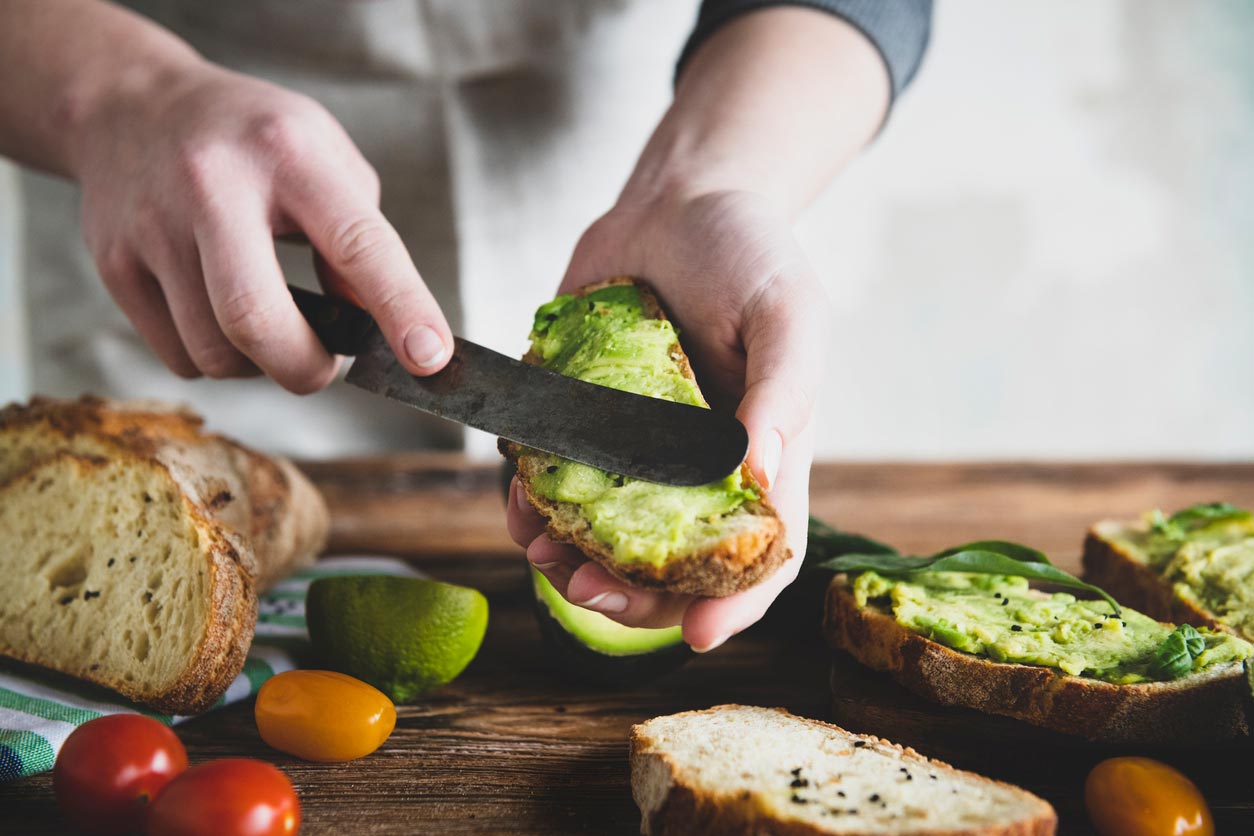 preparing an avocado sandwich