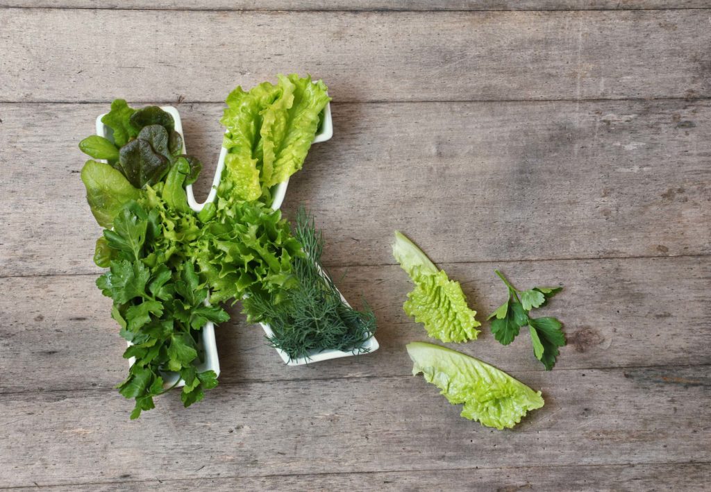 Vitamin K spelled out in leafy greens and herbs
