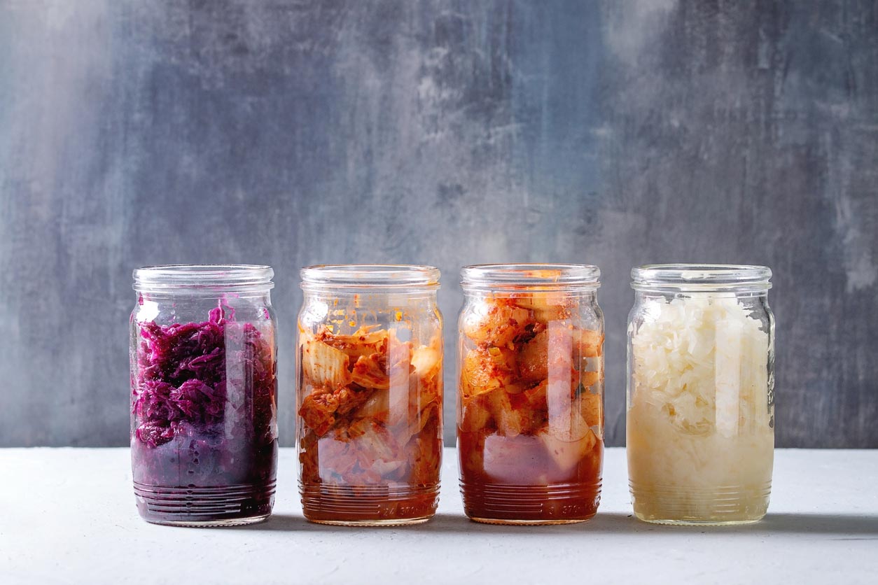 variety of kimchi in jars