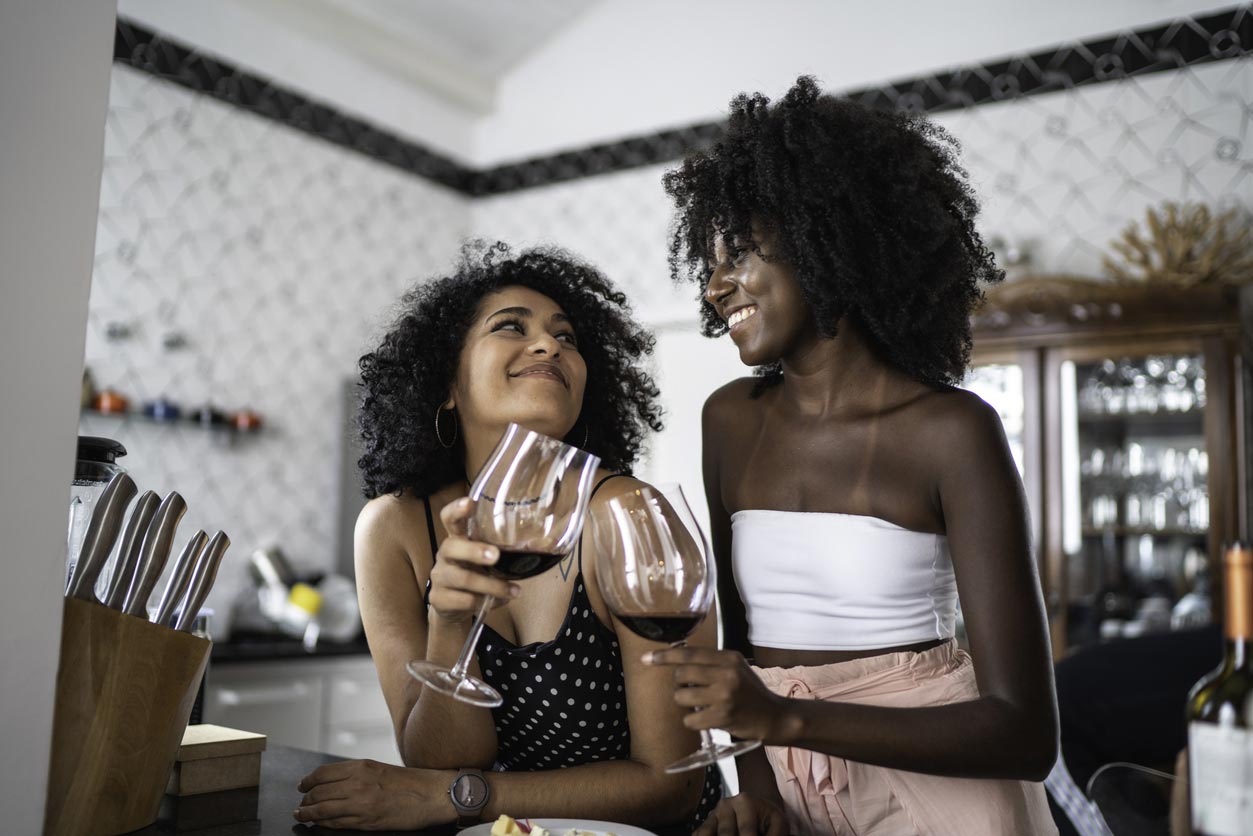 women enjoying wine