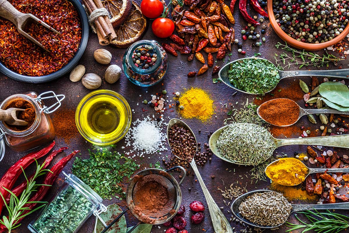 spices and herbs shot from above on rustic table