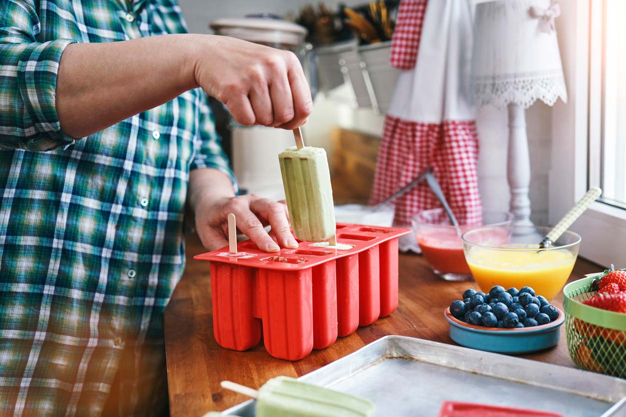 preparing healthy homemade popsicles