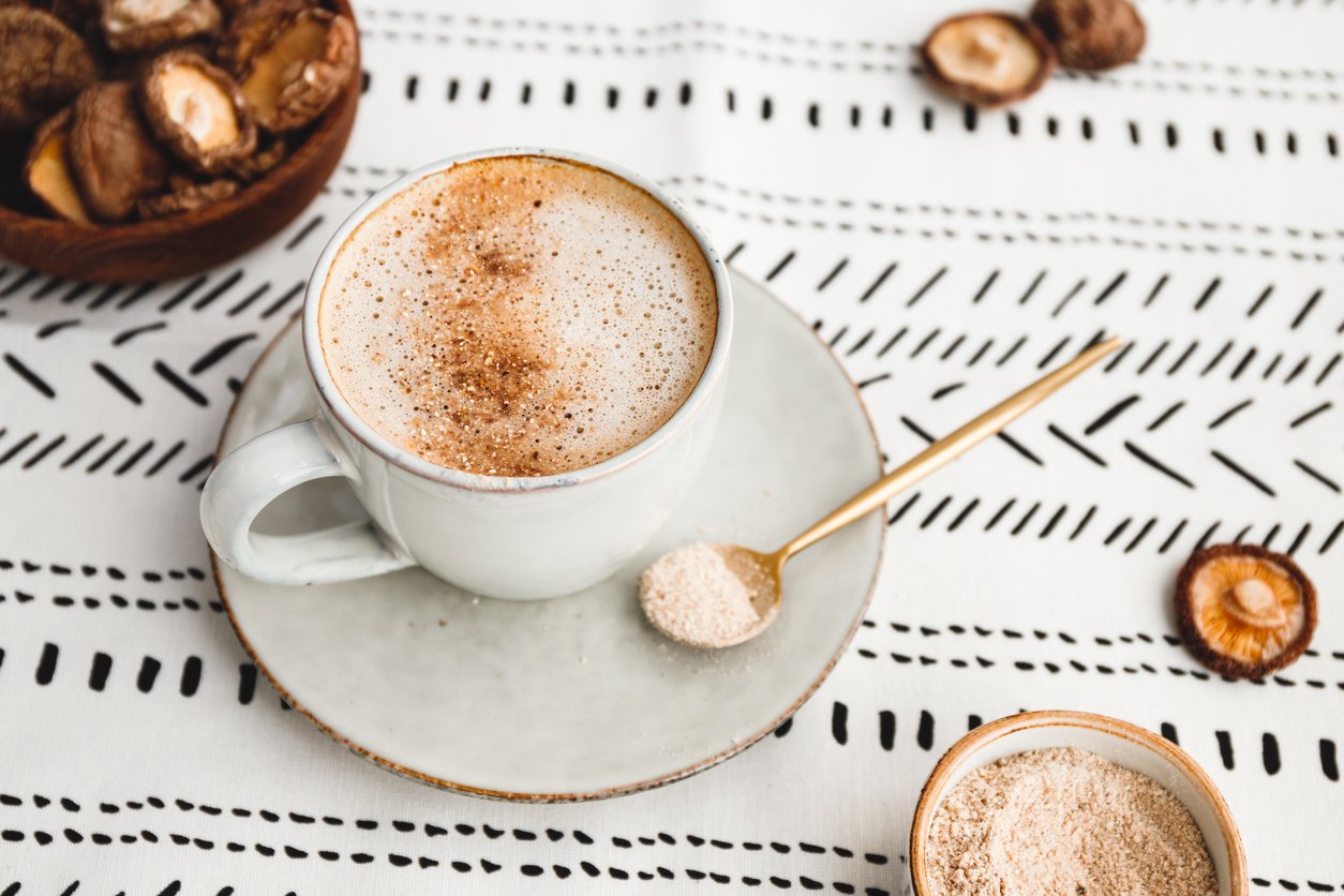 Mushroom latte with Shiitake powder and unsweetened coconut-almond blend milk. Healthy useful vegan drink.