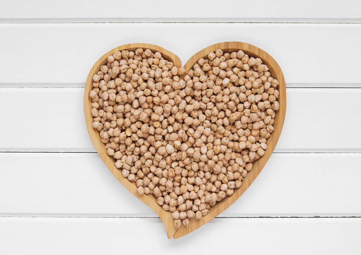 dried garbanzos in heart-shaped bowl