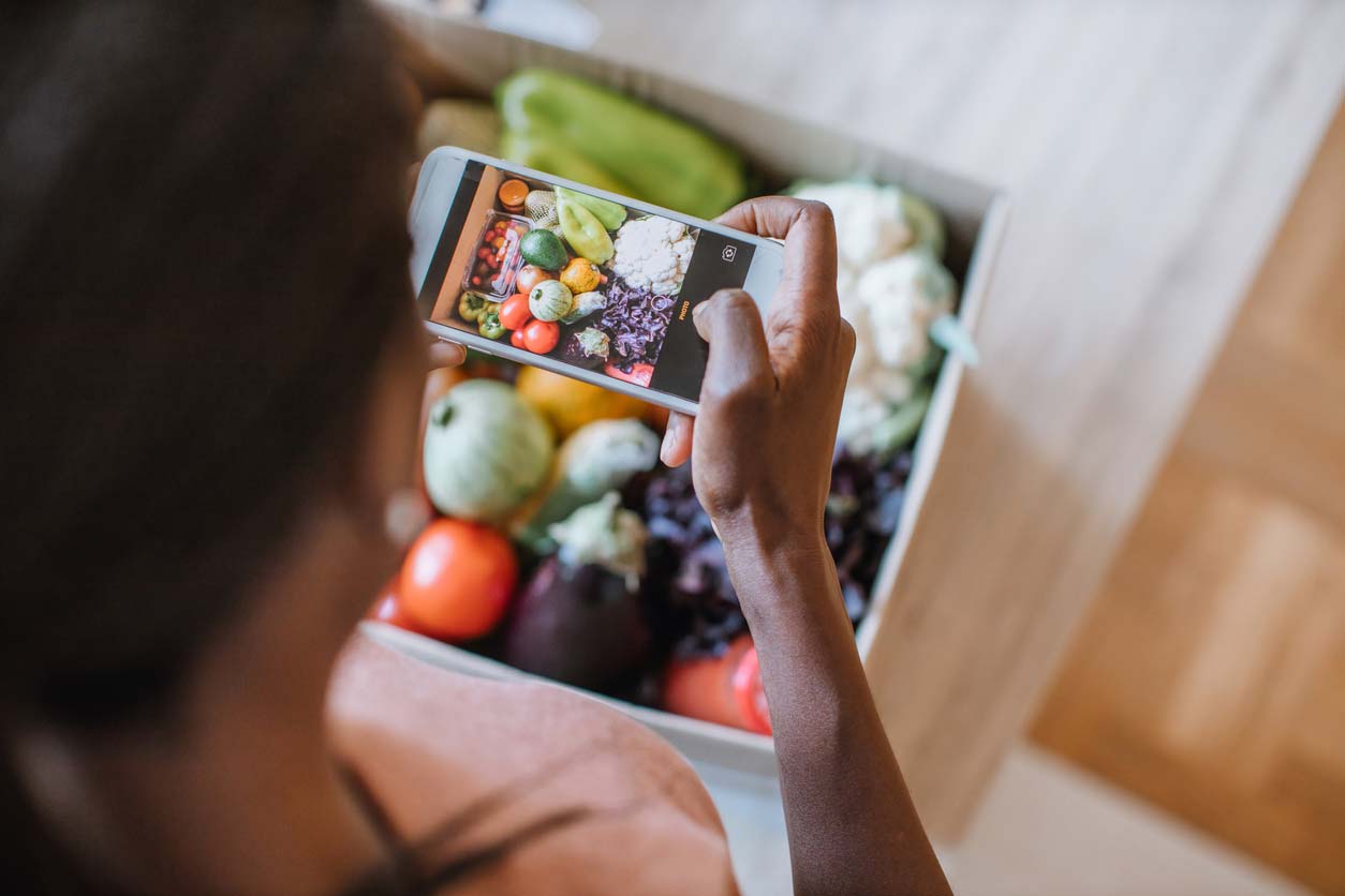 Photographing produce in a CSA box