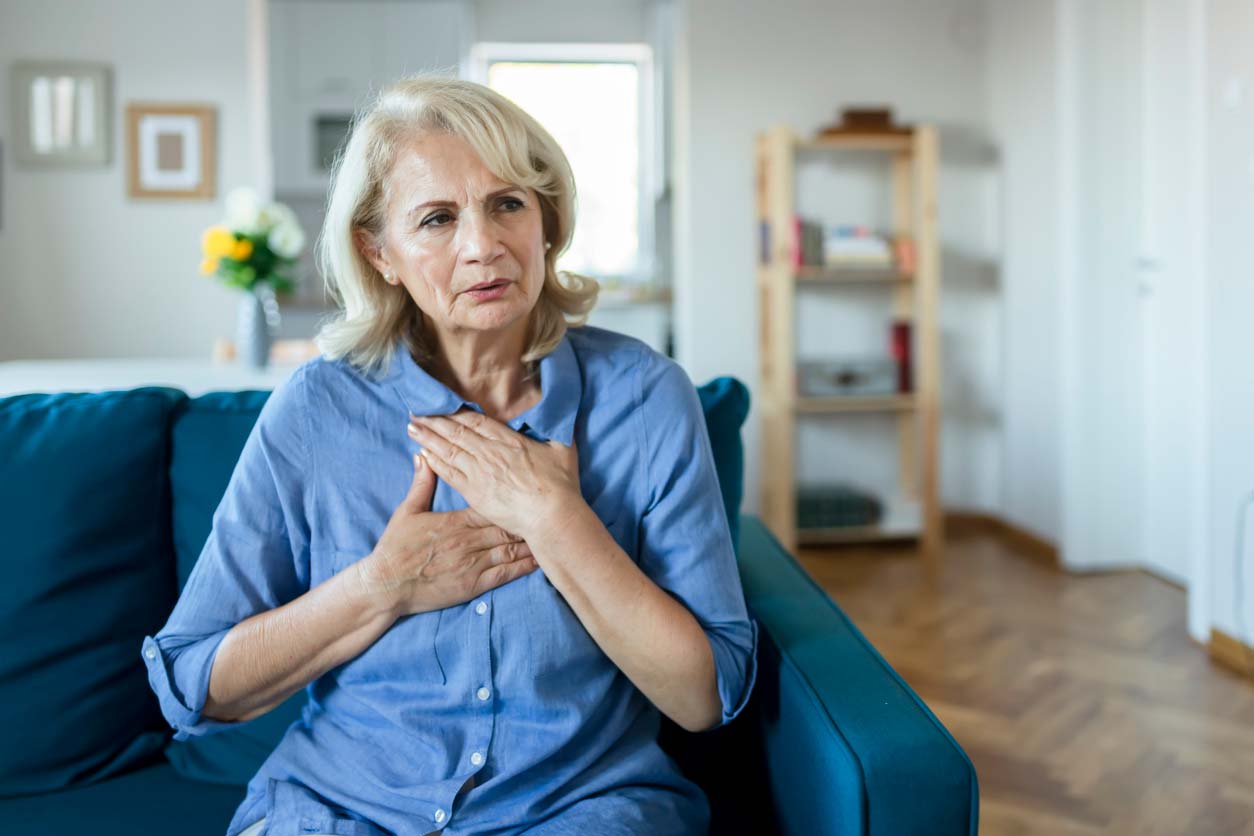 Anxiety self help: Woman holding her chest