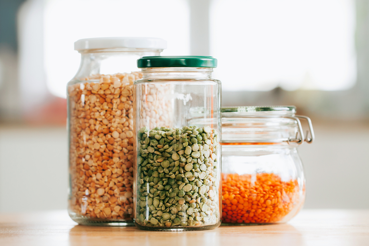 Glass jars with beans in the minimalistic interior