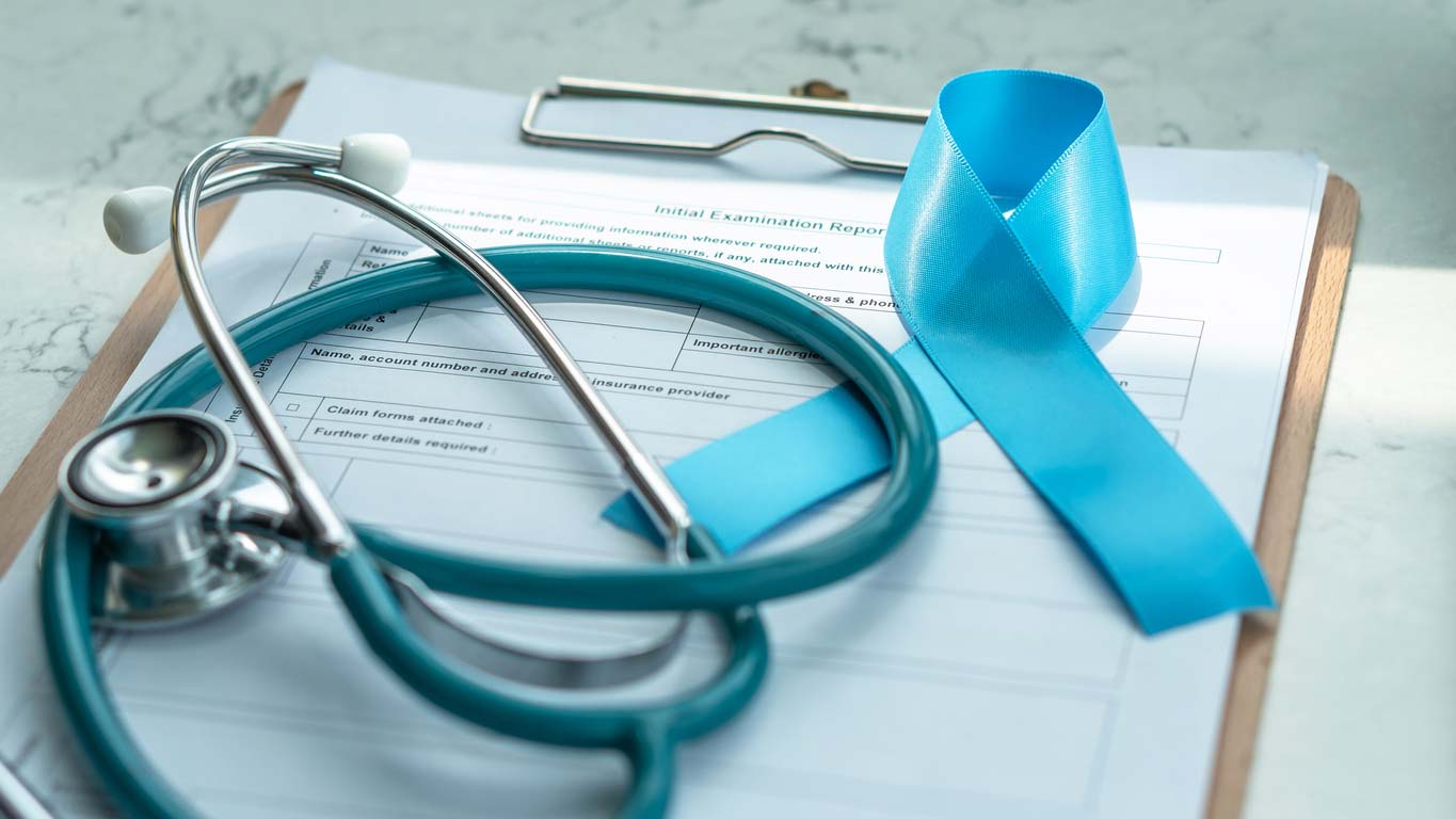 blue awareness ribbon for prostate cancer and stethoscope