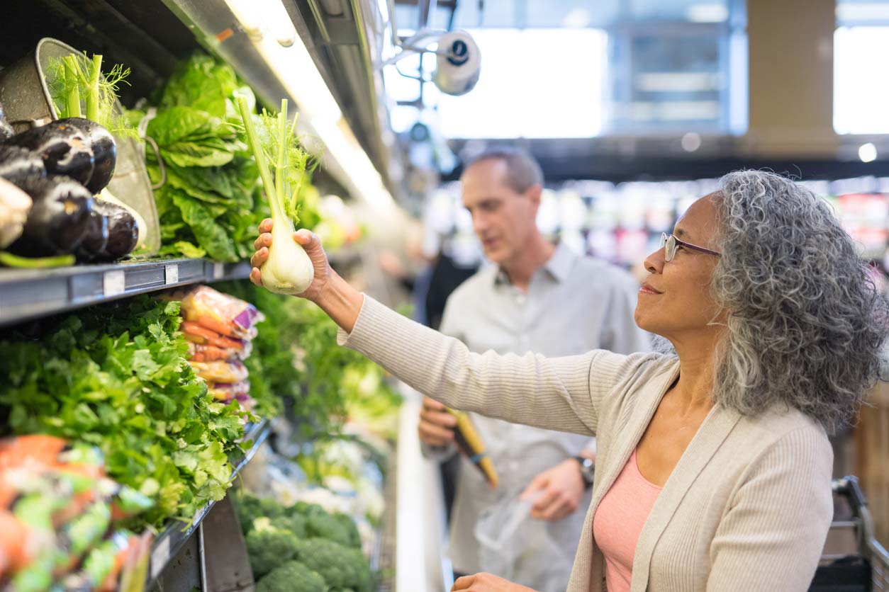 Senior couple shops at supermarket