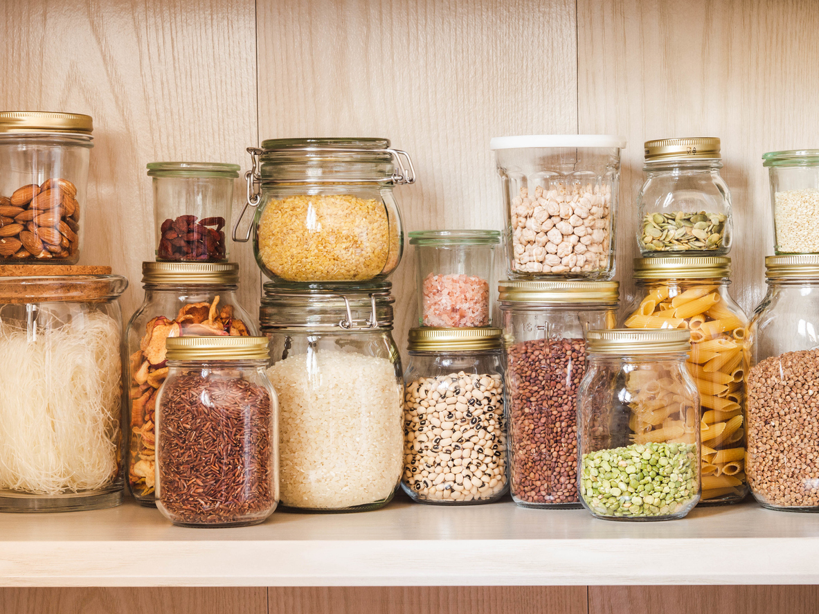 Shelf in the kitchen with various cereals and seeds