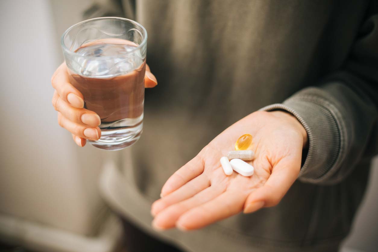 hand holding zinc supplements