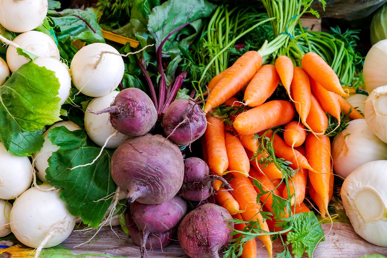 Rome, Italy -- A view of red and white turnips, carrots and fennel. The traditional Italian cuisine is based on the Mediterranean diet, considered the most balanced and sustainable in the world, composed of natural and fresh and healthy products, including fruit, vegetables and cereals. Image in HD format