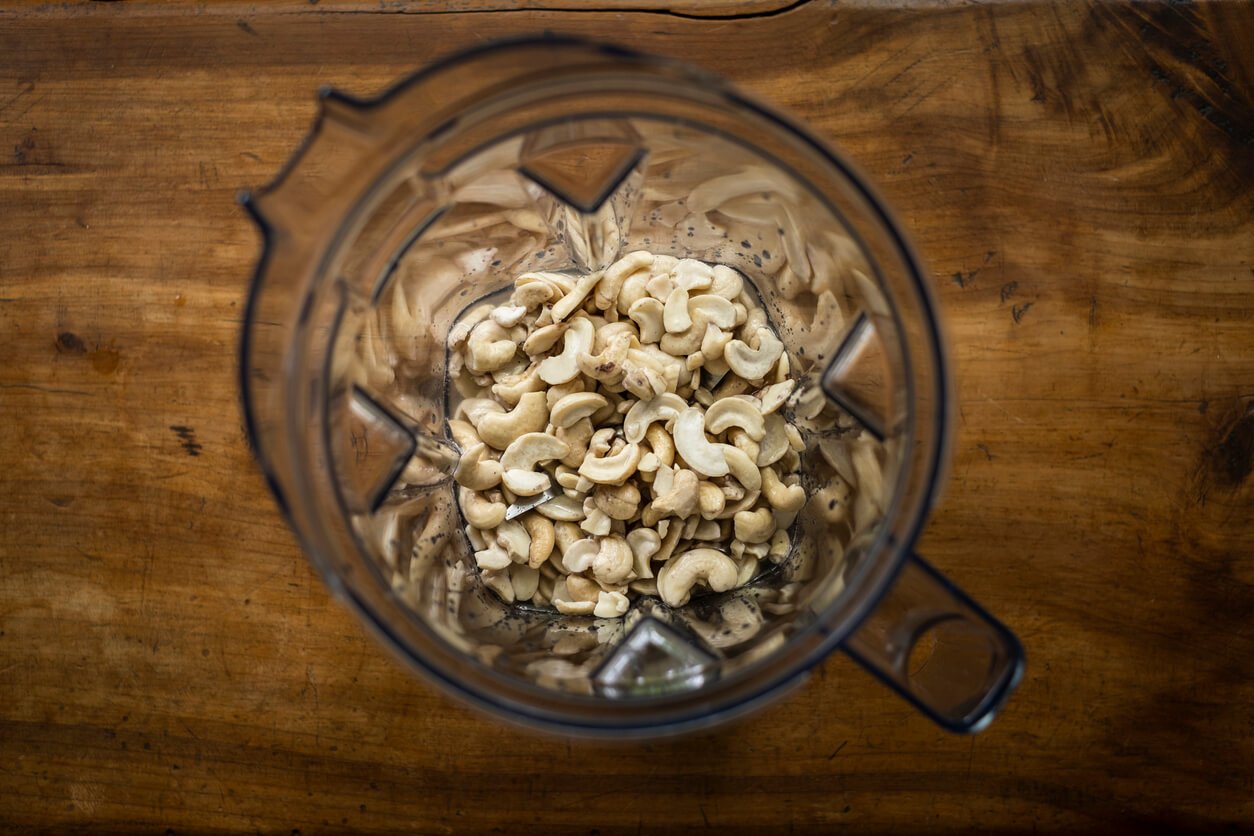 raw cashews in a blender