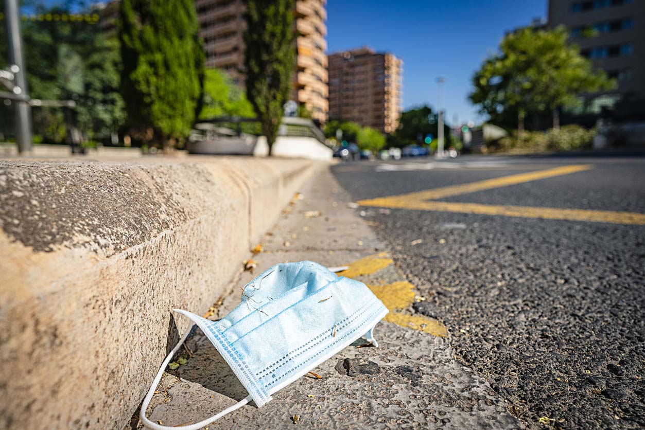 abandoned medical mask in public park