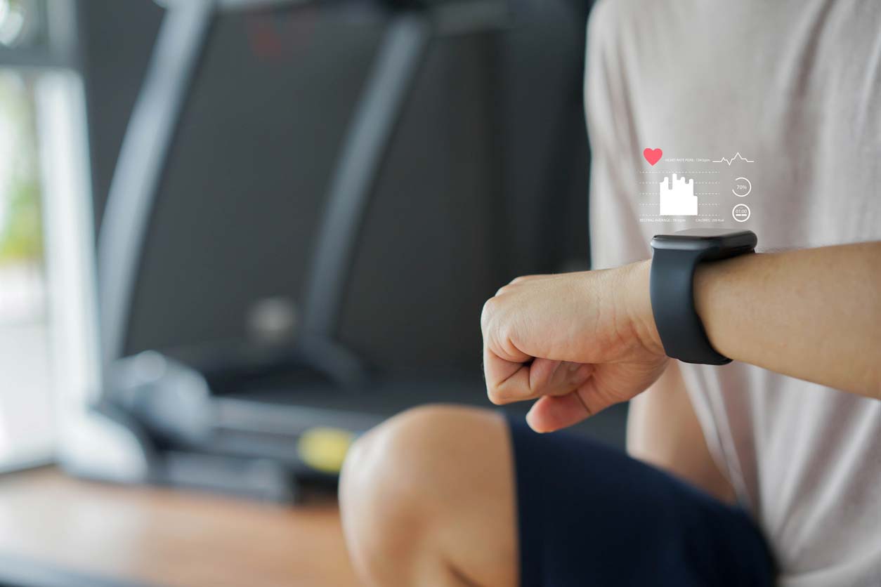 closeup of man monitoring watch health tracker