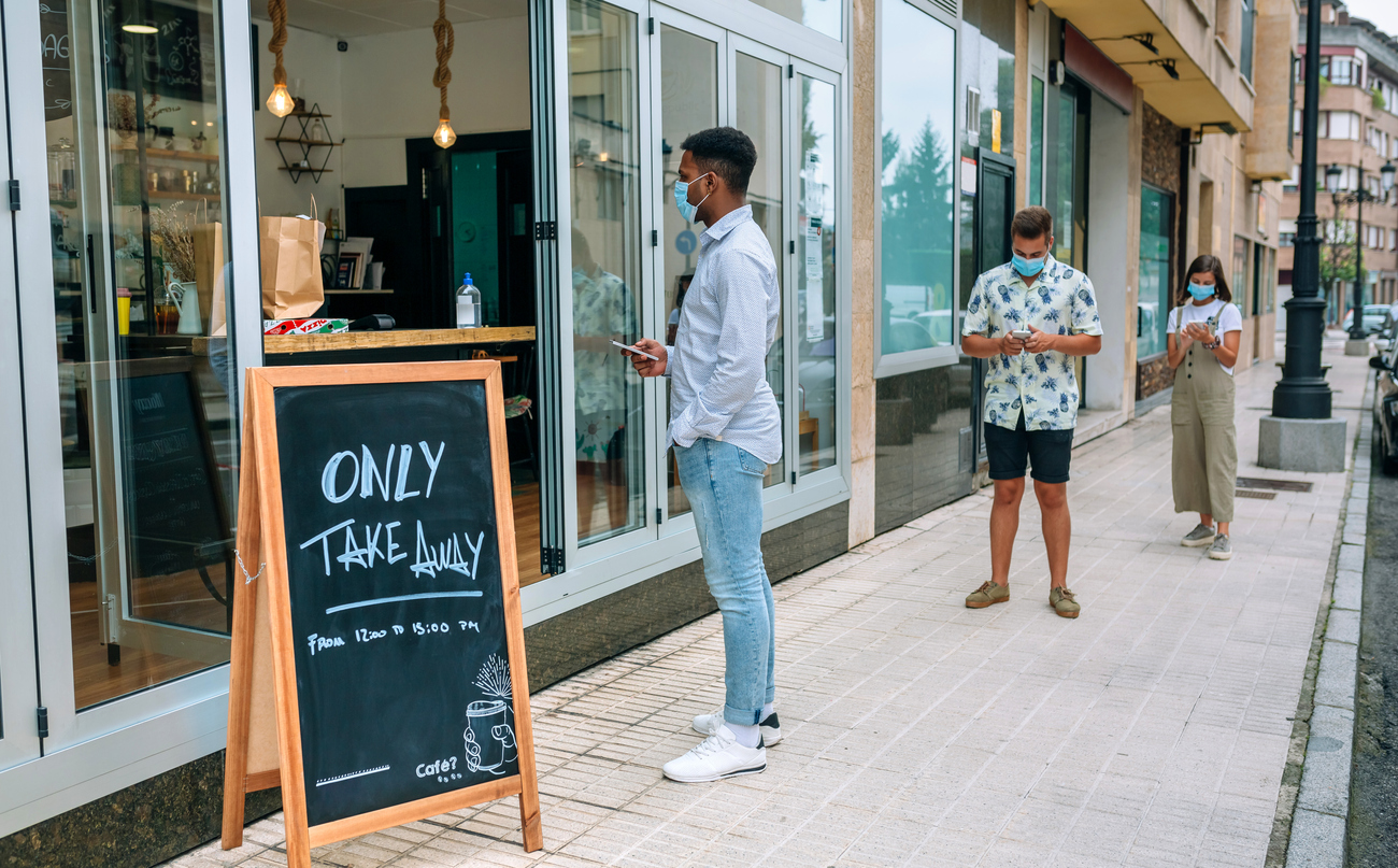 People waiting to buy take away food