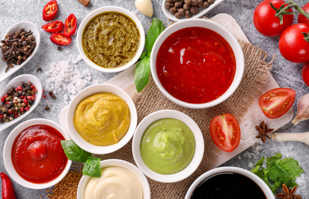 Set of homemade sauces in small bowls