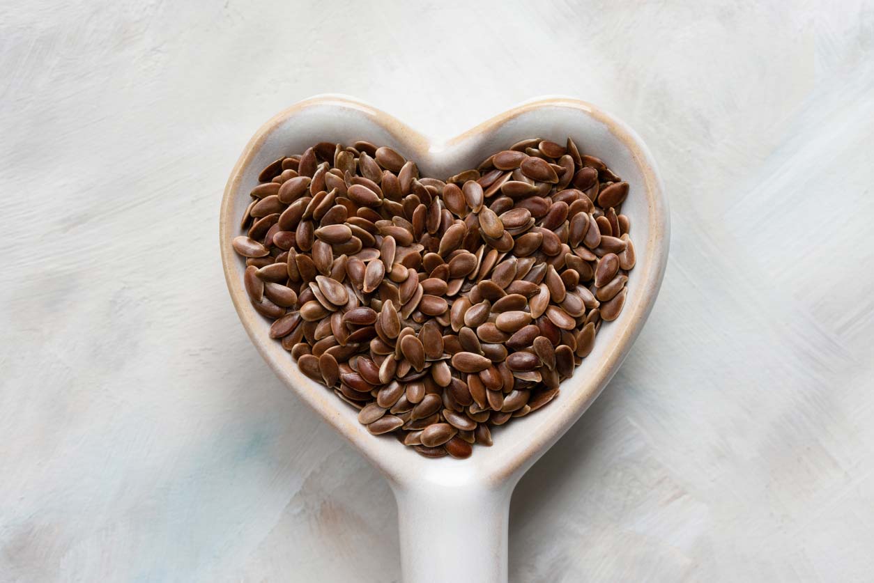 flaxseeds in a heart shaped spoon