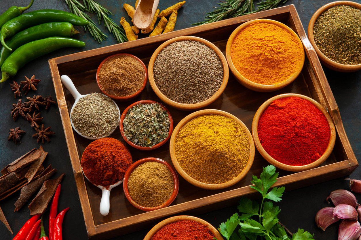 An assortment of herbs and spices to make up a delicious Indian or Asian Cuisine on various backgrounds